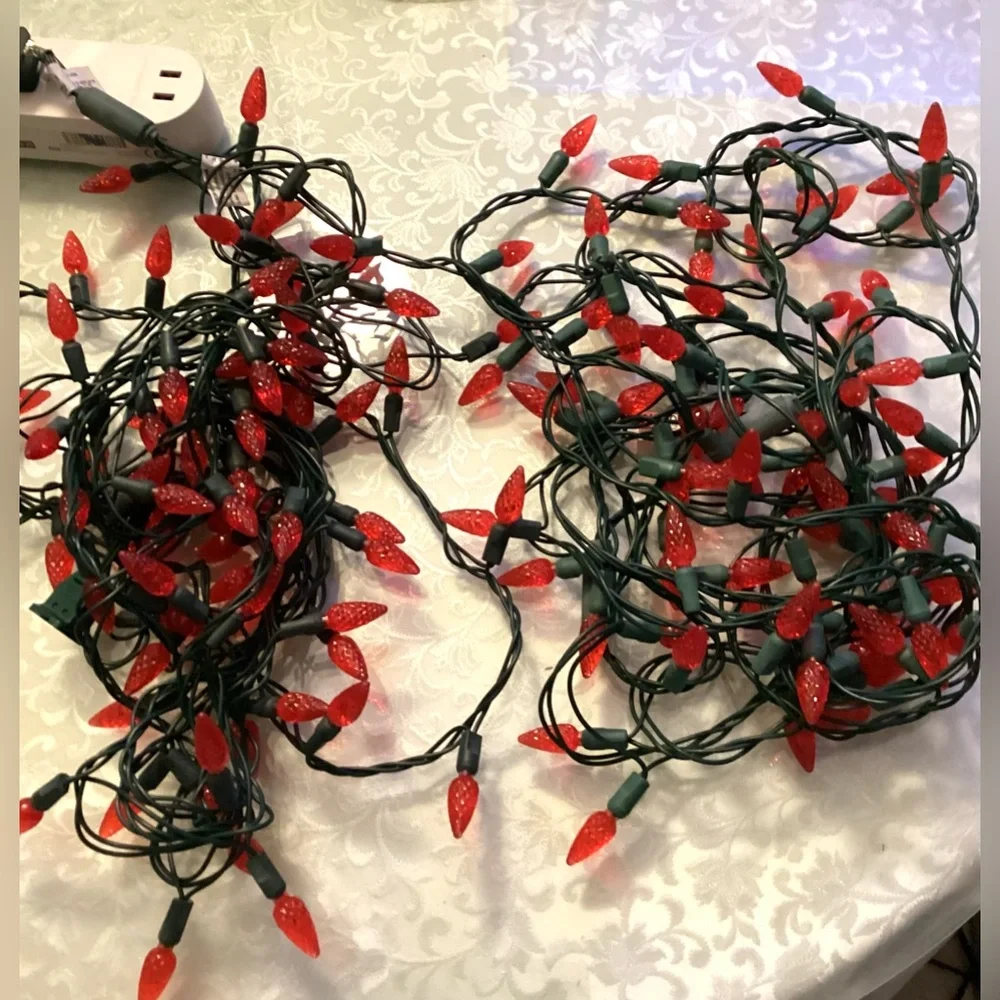 2 Christmas strings red light, bulbs faceted cone shape.